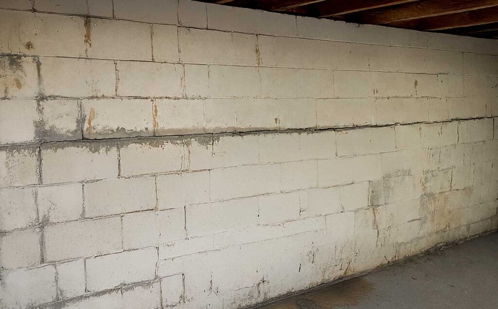 cracked leaning bowing basement wall deterioration